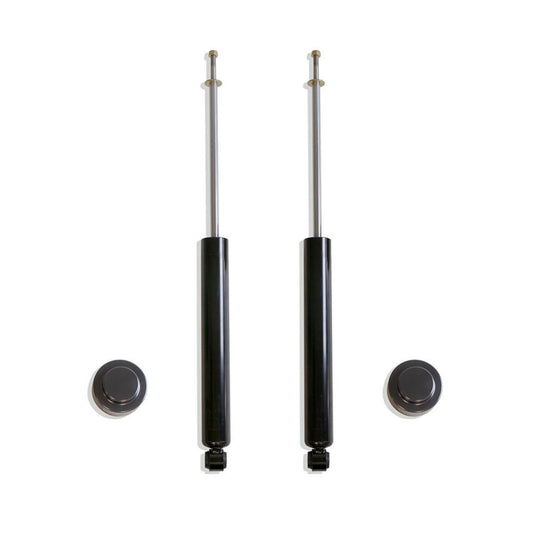 Aluminum rear coil spacers and MaxTrac rear shocks | Completes 4 inch lift | Grey anodized suspension kit