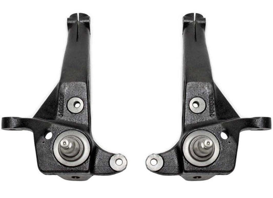 Ductile steel front spindles MaxTrac 703030A 4-inch lift spindles for 1998–2000 Ford Ranger 2WD coil spring suspension with black e-coated finish.